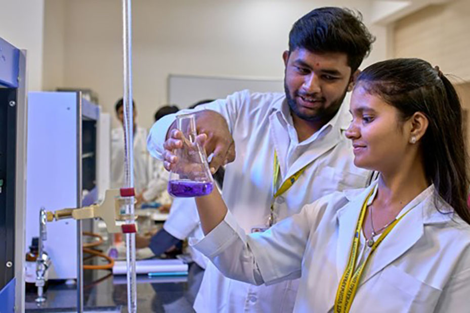 MIT VPU pharmacy student studying drug formulations in the lab