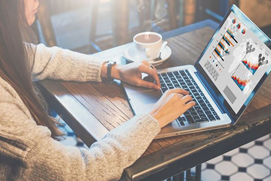 MIT VPU MBA student analyzing business data on laptop