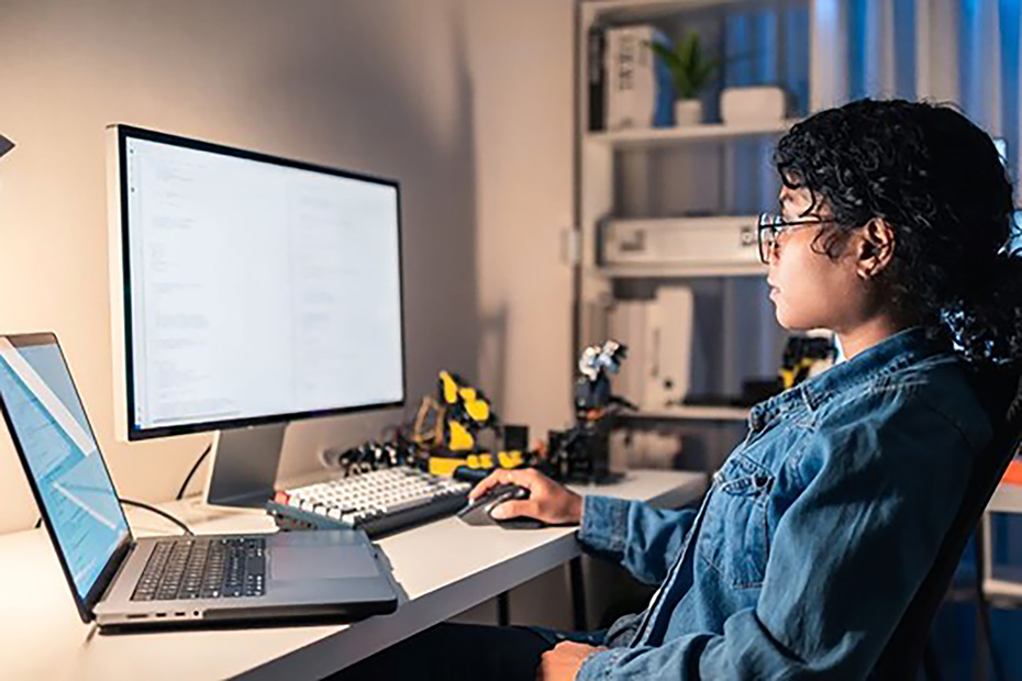MIT VPU student working on AI model in lab for Computer Science program